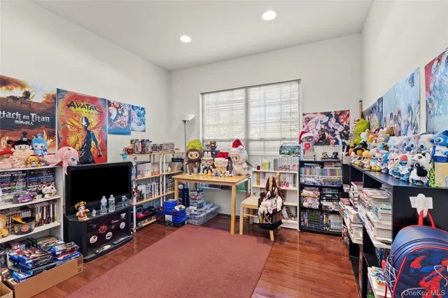 a living room filled with lots of furniture and a play ground