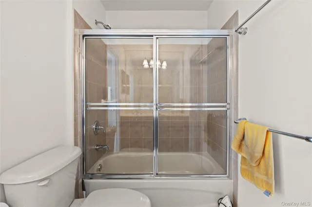 a view of a storage and utility room with a window