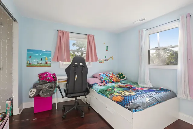 a bedroom with furniture and a bed