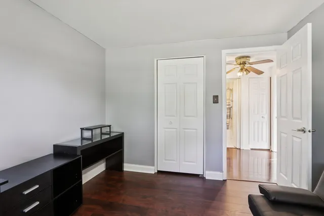 a view of room with wooden floor and window