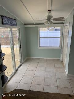 1034 Bali Road Cocoa Beach, FL 32931 - Photo 14 of 40 a view of a kitchen with a sink and a window
