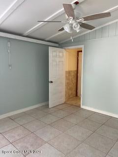 1034 Bali Road Cocoa Beach, FL 32931 - Photo 18 of 40 a view of an empty room