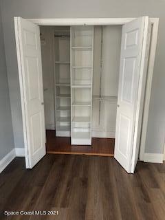 1034 Bali Road Cocoa Beach, FL 32931 - Photo 25 of 40 a view of walk in closet with empty racks