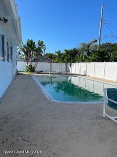 1034 Bali Road Cocoa Beach, FL 32931 - Photo 4 of 40 a view of a backyard