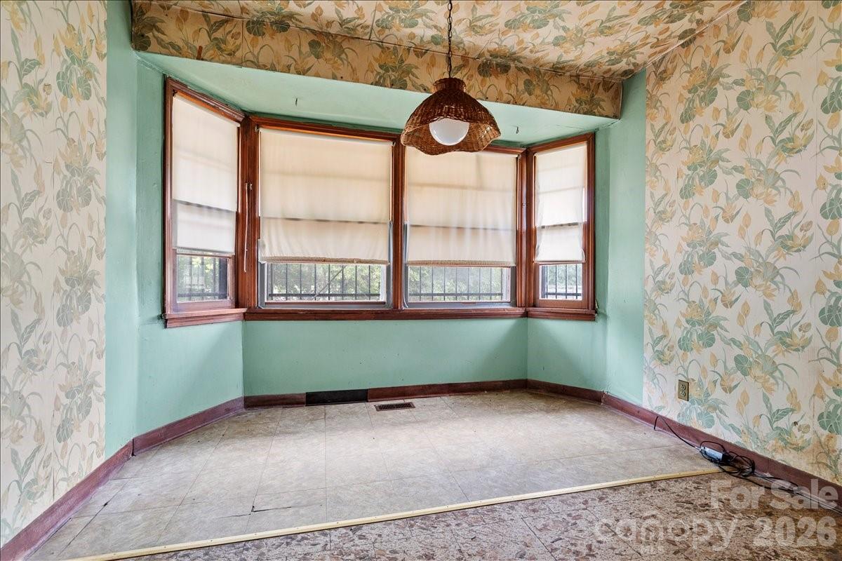 1444 Society Hill Road Darlington, SC 29540 - Photo 12 of 35 an empty room with a window and ceiling fan