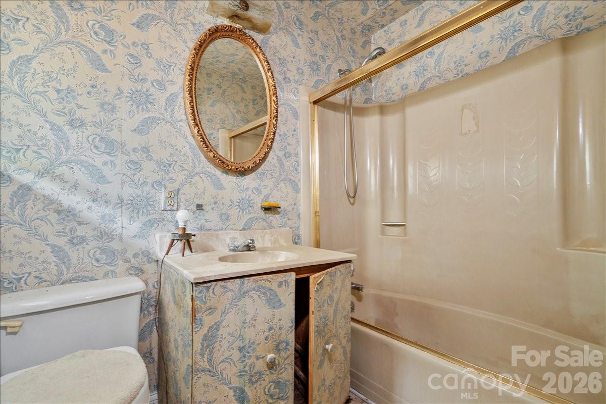 1444 Society Hill Road Darlington, SC 29540 - Photo 20 of 35 a bathroom with a sink a toilet and a mirror