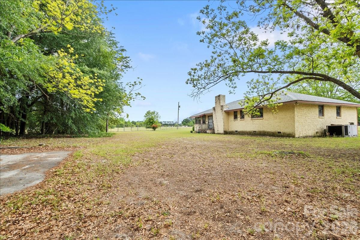 1444 Society Hill Road Darlington, SC 29540 - Photo 25 of 35 a view of a house with a yard