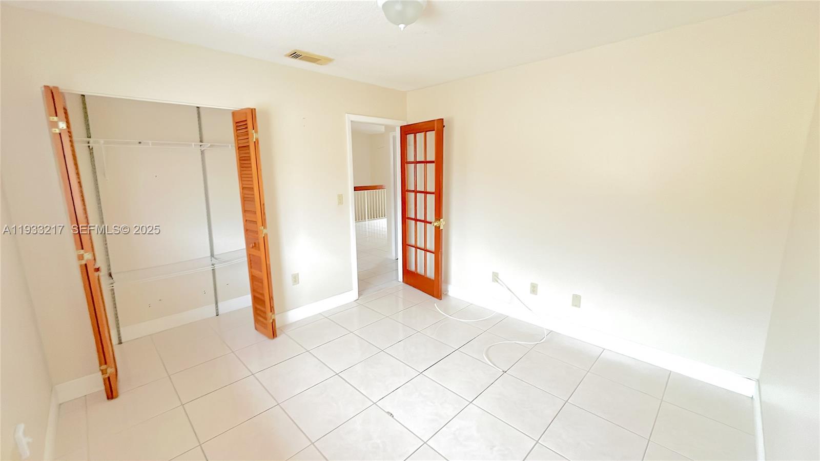 2220 West 74th Street, Unit 20116 Hialeah, FL 33016 - Photo 12 of 23 a view of an empty room