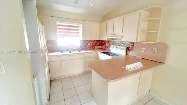 a view of an empty room with window