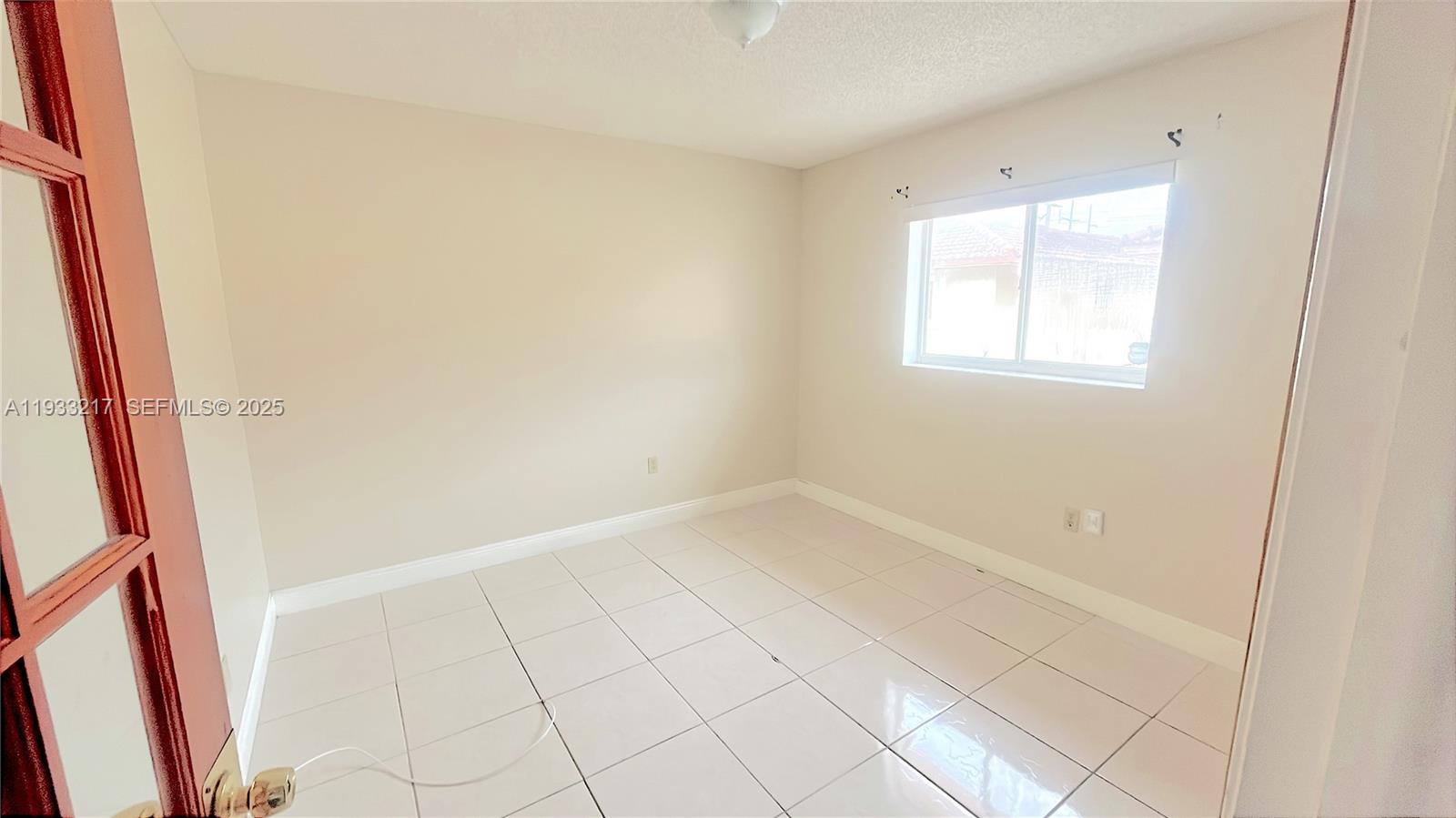2220 West 74th Street, Unit 20116 Hialeah, FL 33016 - Photo 3 of 23 a view of an empty room