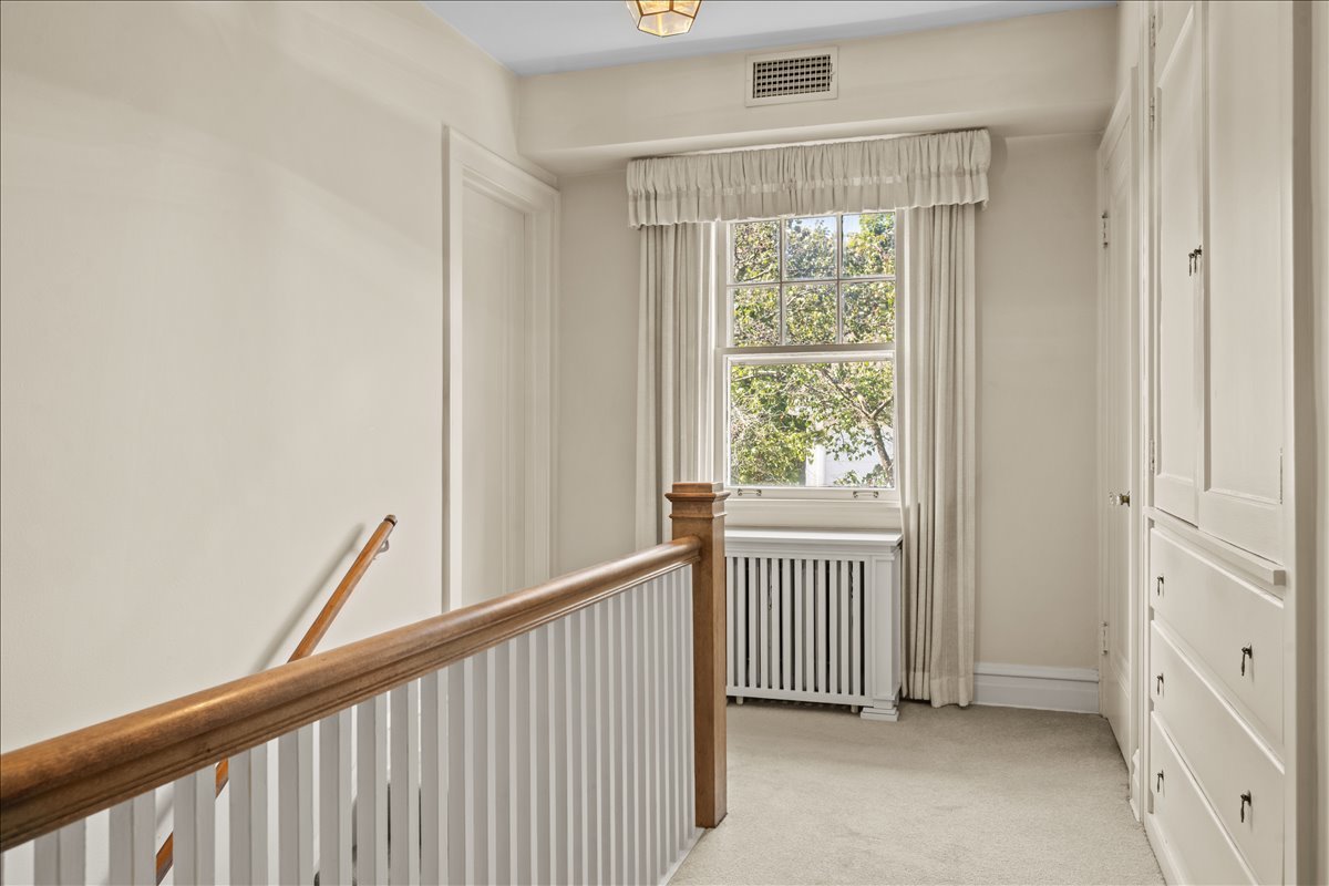 27 Logan Terrace Golf, IL 60029 - Photo 13 of 30 a view of a hallway to window and an empty room