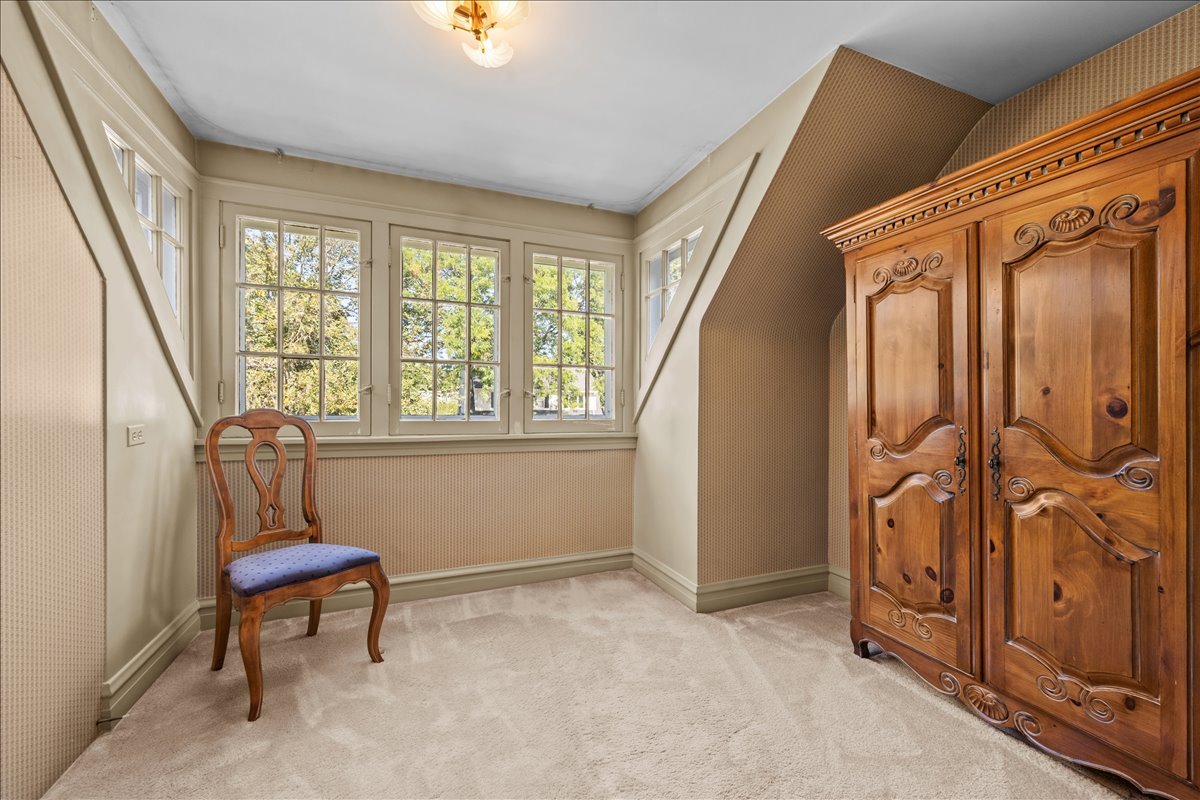 27 Logan Terrace Golf, IL 60029 - Photo 15 of 30 a living room with furniture and a window
