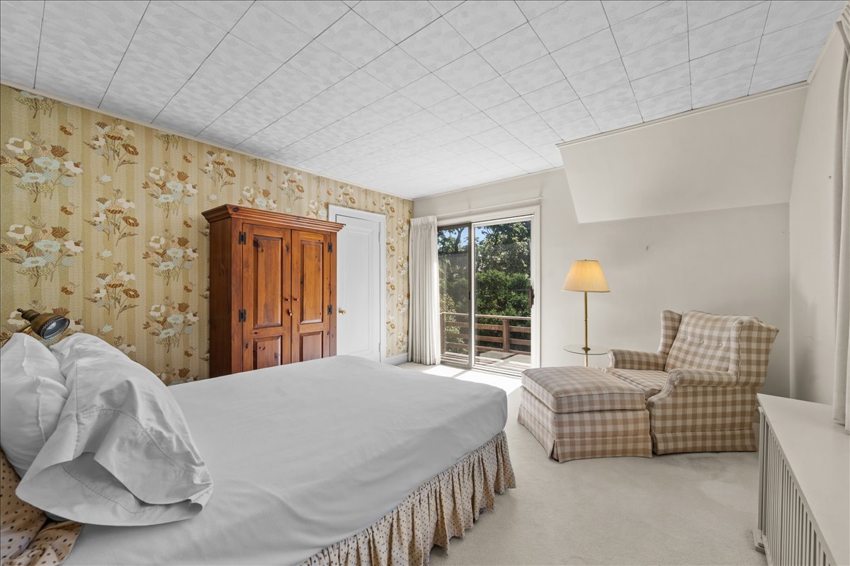 27 Logan Terrace Golf, IL 60029 - Photo 17 of 30 a bedroom with a bed and a couch