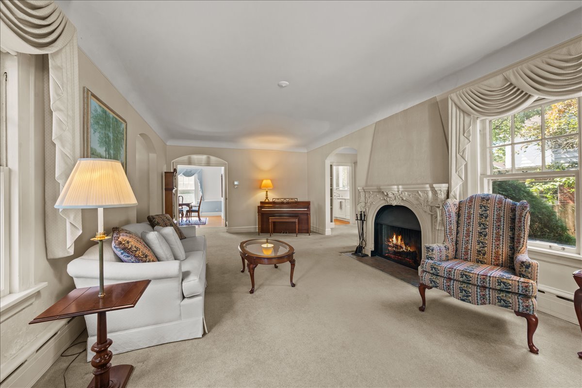27 Logan Terrace Golf, IL 60029 - Photo 6 of 30 a living room with furniture and a fireplace