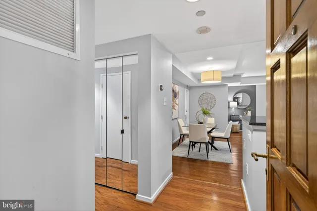 a view of a hallway with seating area