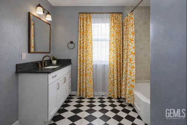 a bathroom with a sink and a bathtub