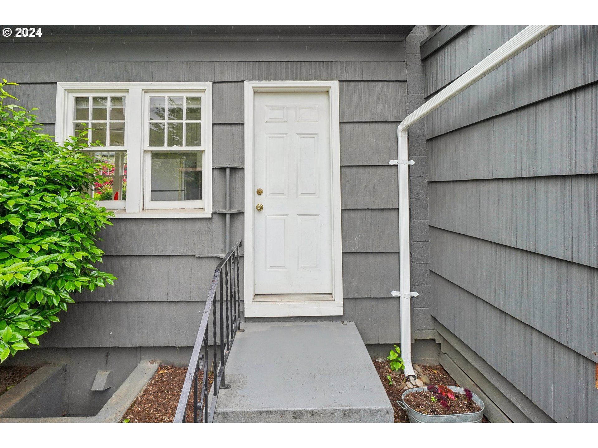 1510 Northeast 19th Avenue, Unit 4 Portland, OR 97232 - Photo 22 of 39 a view of outdoor space and front door