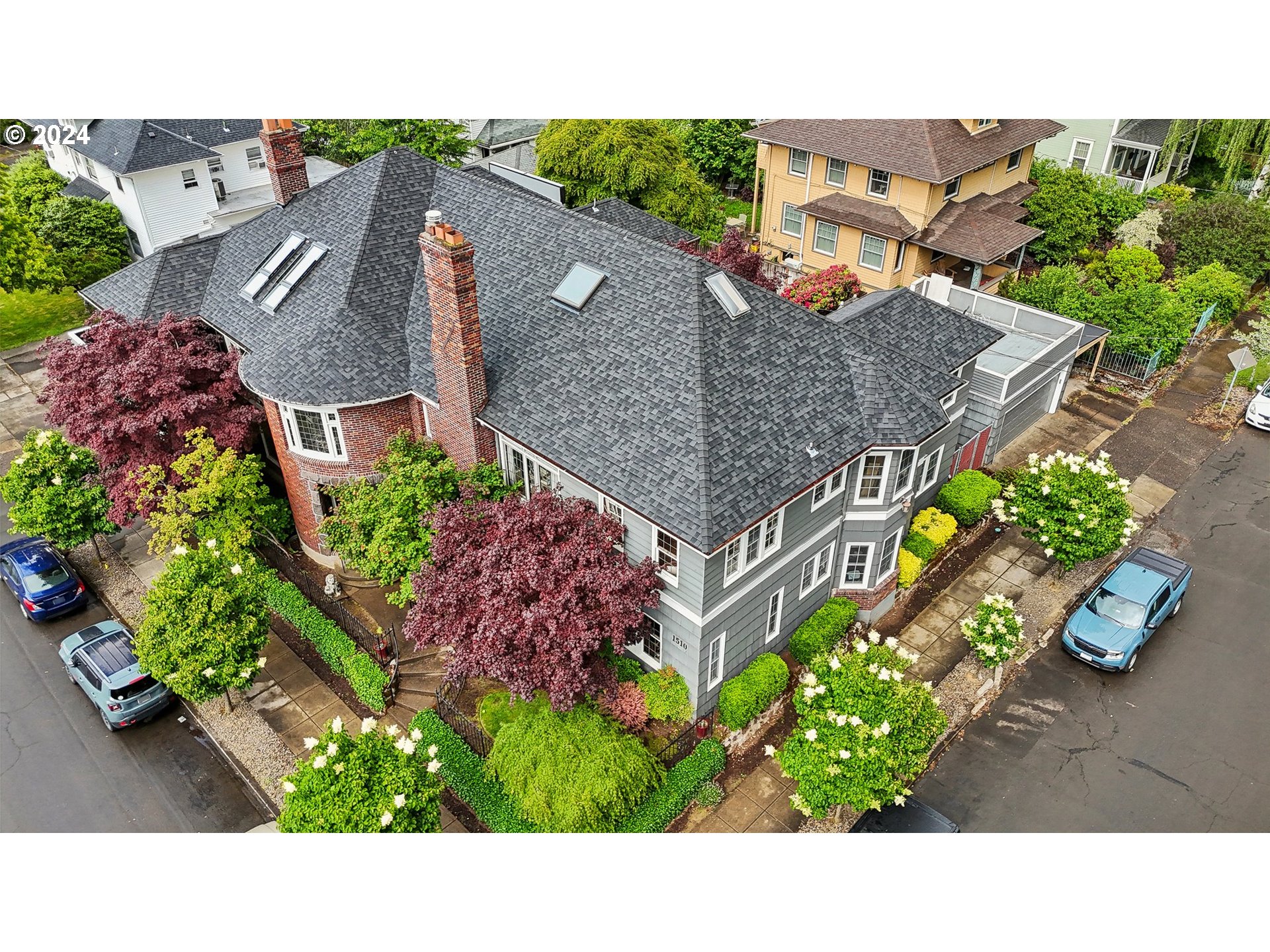 1510 Northeast 19th Avenue, Unit 4 Portland, OR 97232 - Photo 28 of 39 an aerial view of a house with a yard basket ball court and outdoor seating