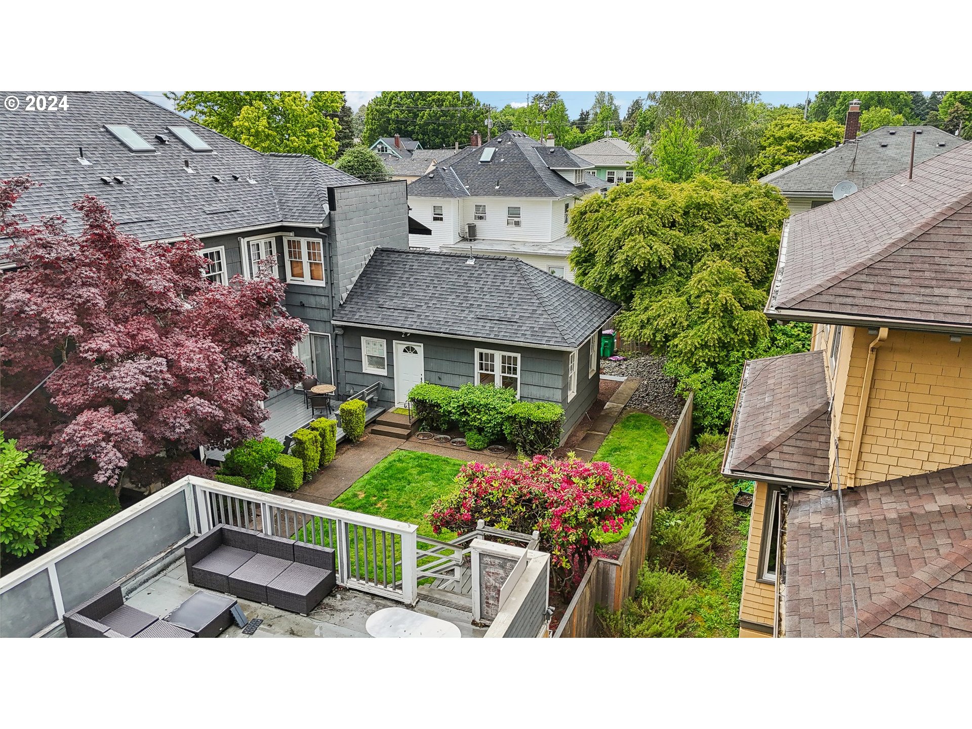 1510 Northeast 19th Avenue, Unit 4 Portland, OR 97232 - Photo 32 of 39 a house view with a garden space