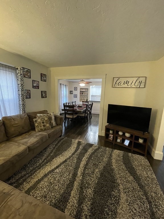 9 Thayer Street Worcester, MA 01603 - Photo 7 of 18 a living room with furniture and a flat screen tv