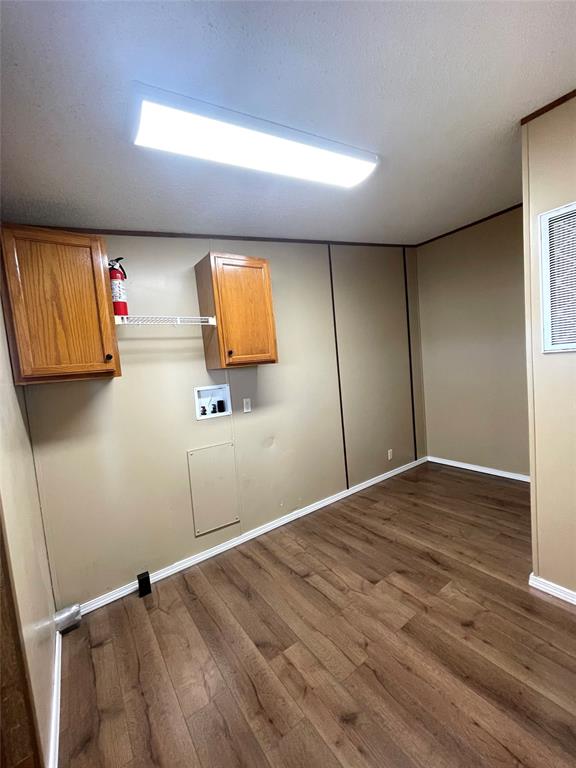 440 Ballman Road Riesel, TX 76682 - Photo 12 of 32 a view of empty room with wooden floor