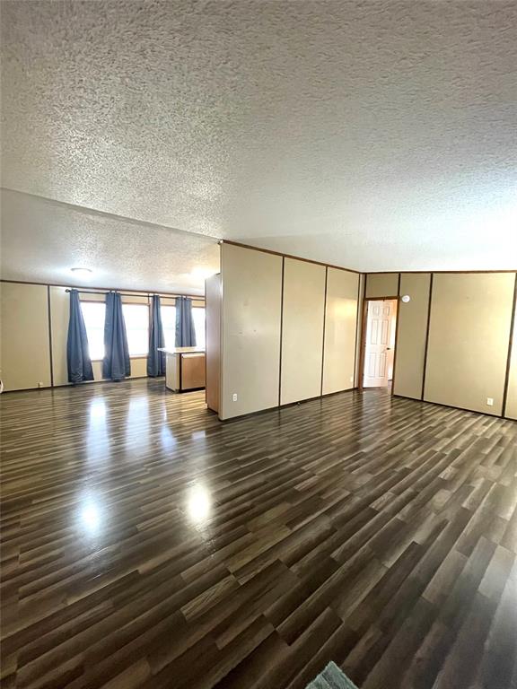 440 Ballman Road Riesel, TX 76682 - Photo 14 of 32 a view of empty room with wooden floor