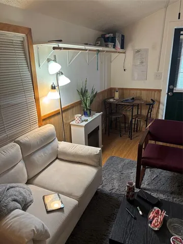 a living room with furniture and a couch