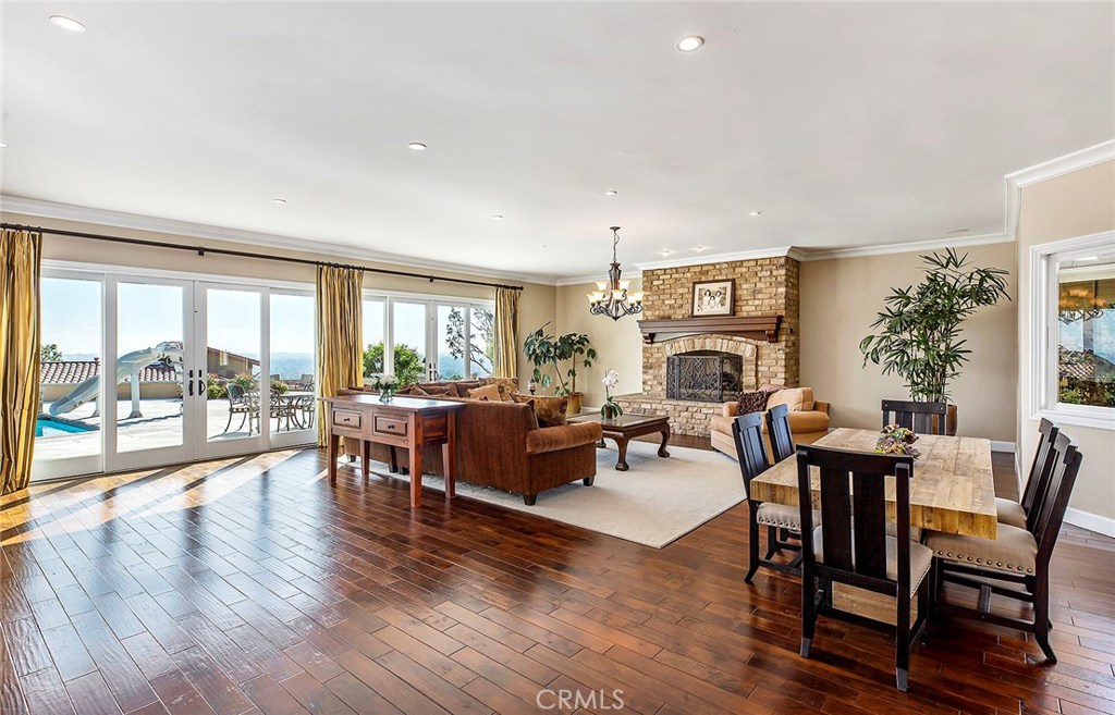 12822 Periwinkle Drive North Tustin, CA 92705 - Photo 11 of 36 a living room with furniture and a large window
