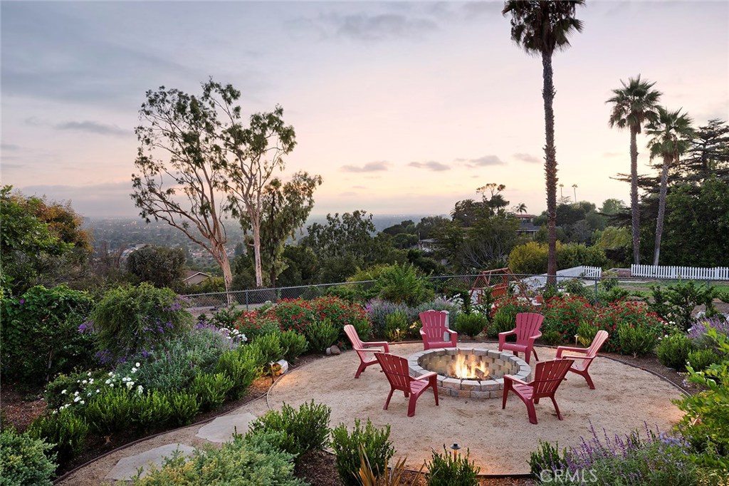 12822 Periwinkle Drive North Tustin, CA 92705 - Photo 25 of 36 a view of a tables and chairs in the garden