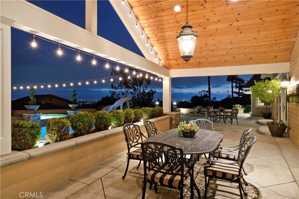 12822 Periwinkle Drive North Tustin, CA 92705 - Photo 5 of 36 a view of a patio with a table and chairs