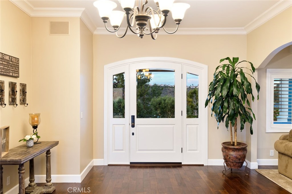 12822 Periwinkle Drive North Tustin, CA 92705 - Photo 10 of 36 a living room with furniture and a potted plant