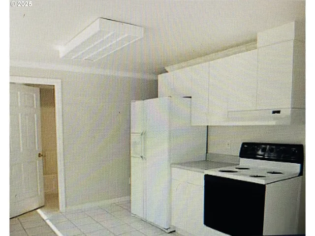 a view of a room with a window