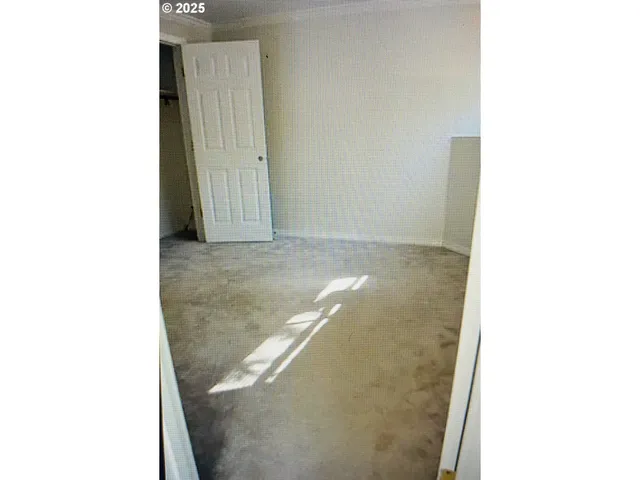 a front view of a building with large windows