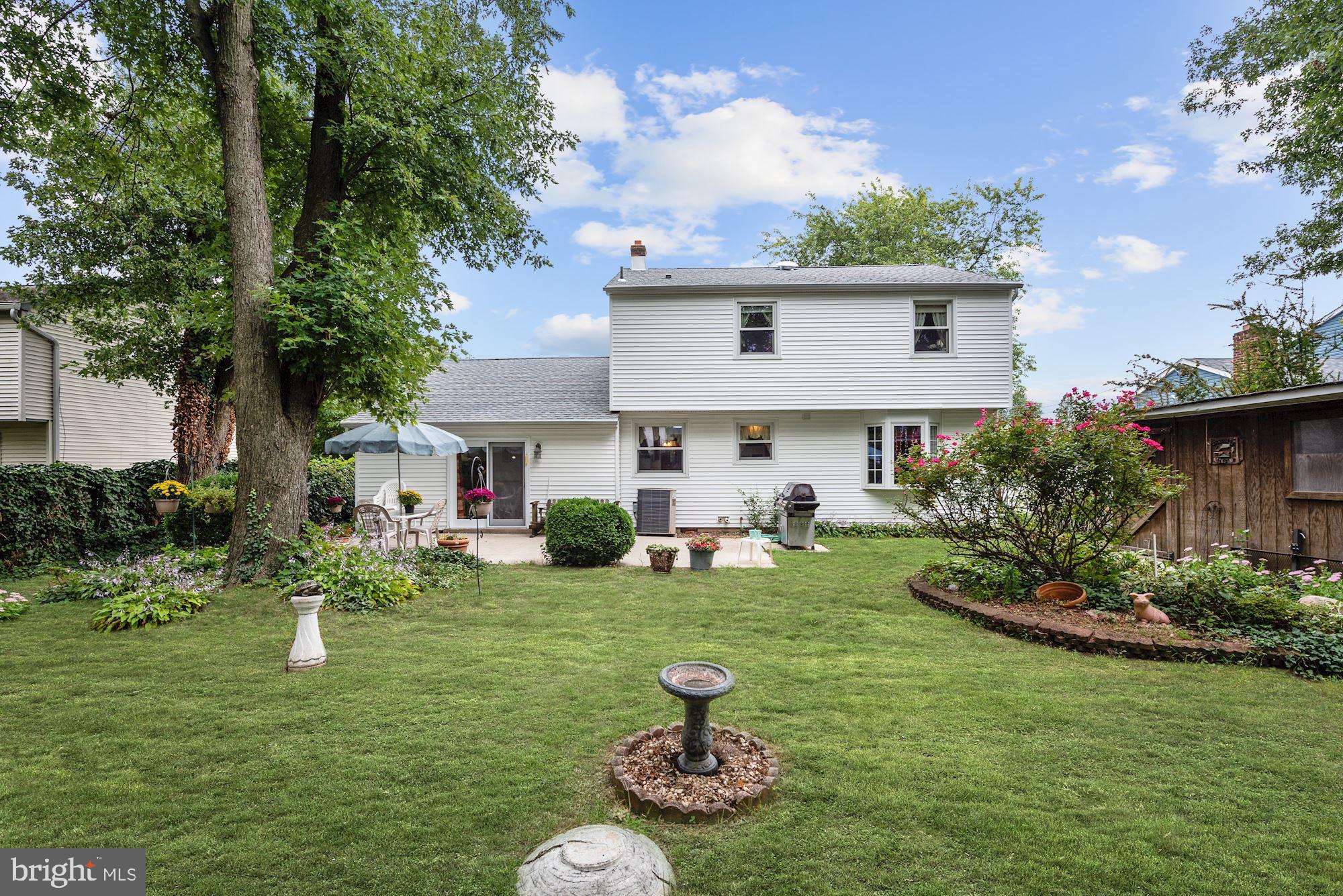 207 Regency Road Edgewater Park, NJ 08010 - Photo 11 of 36 a front view of a house with garden