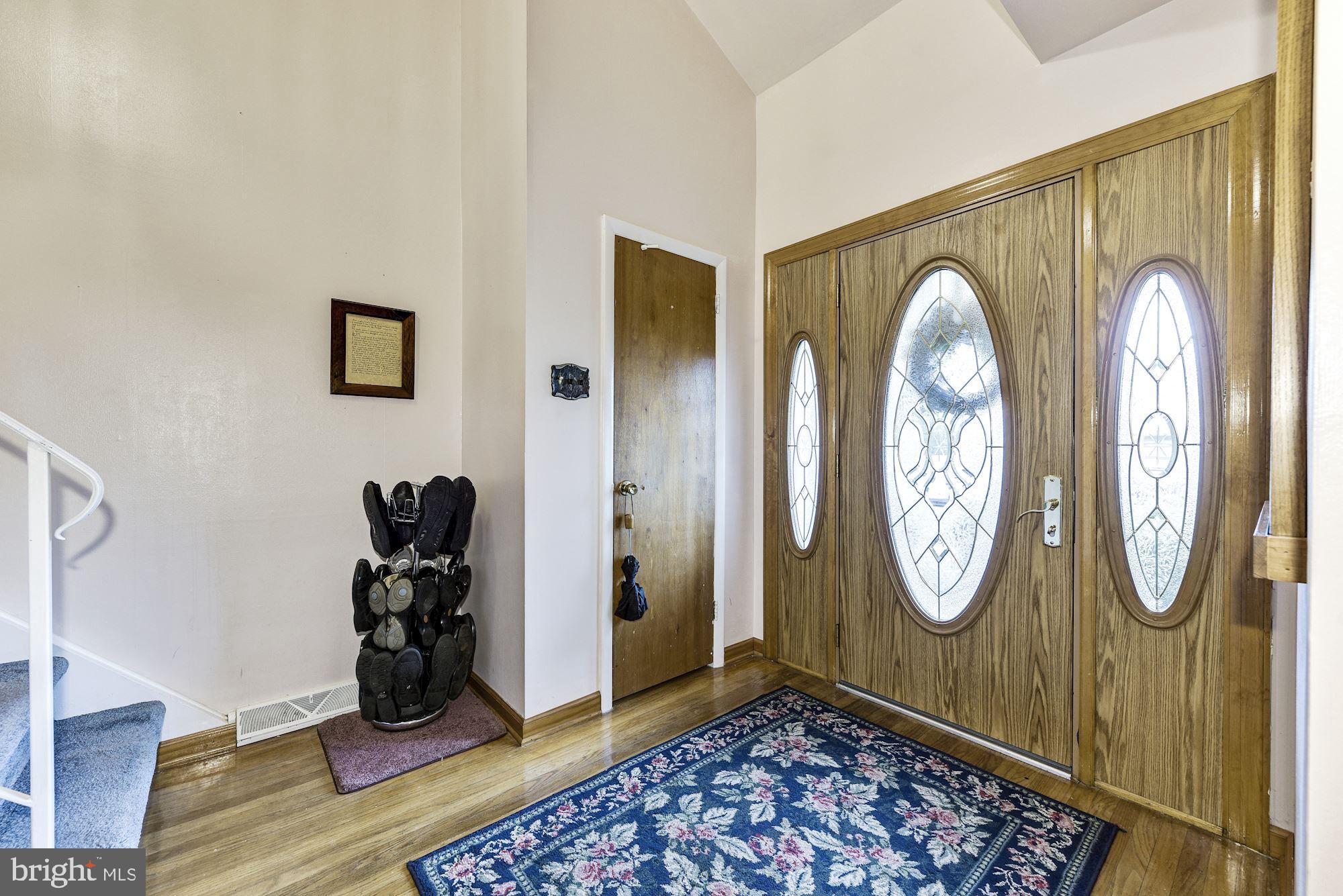 207 Regency Road Edgewater Park, NJ 08010 - Photo 12 of 36 a view of an entryway with wooden floor