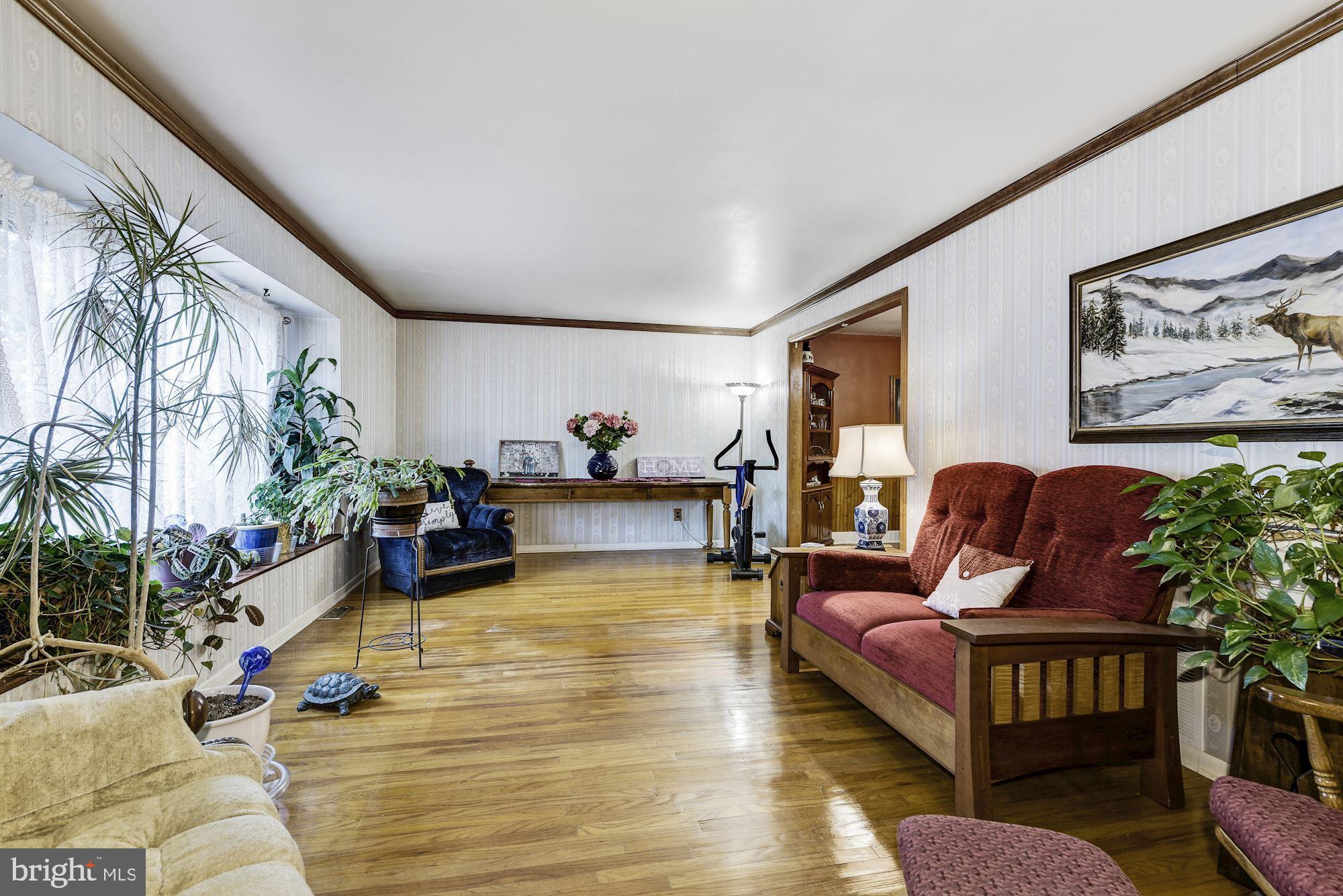 207 Regency Road Edgewater Park, NJ 08010 - Photo 14 of 36 a living room with furniture and wooden floor