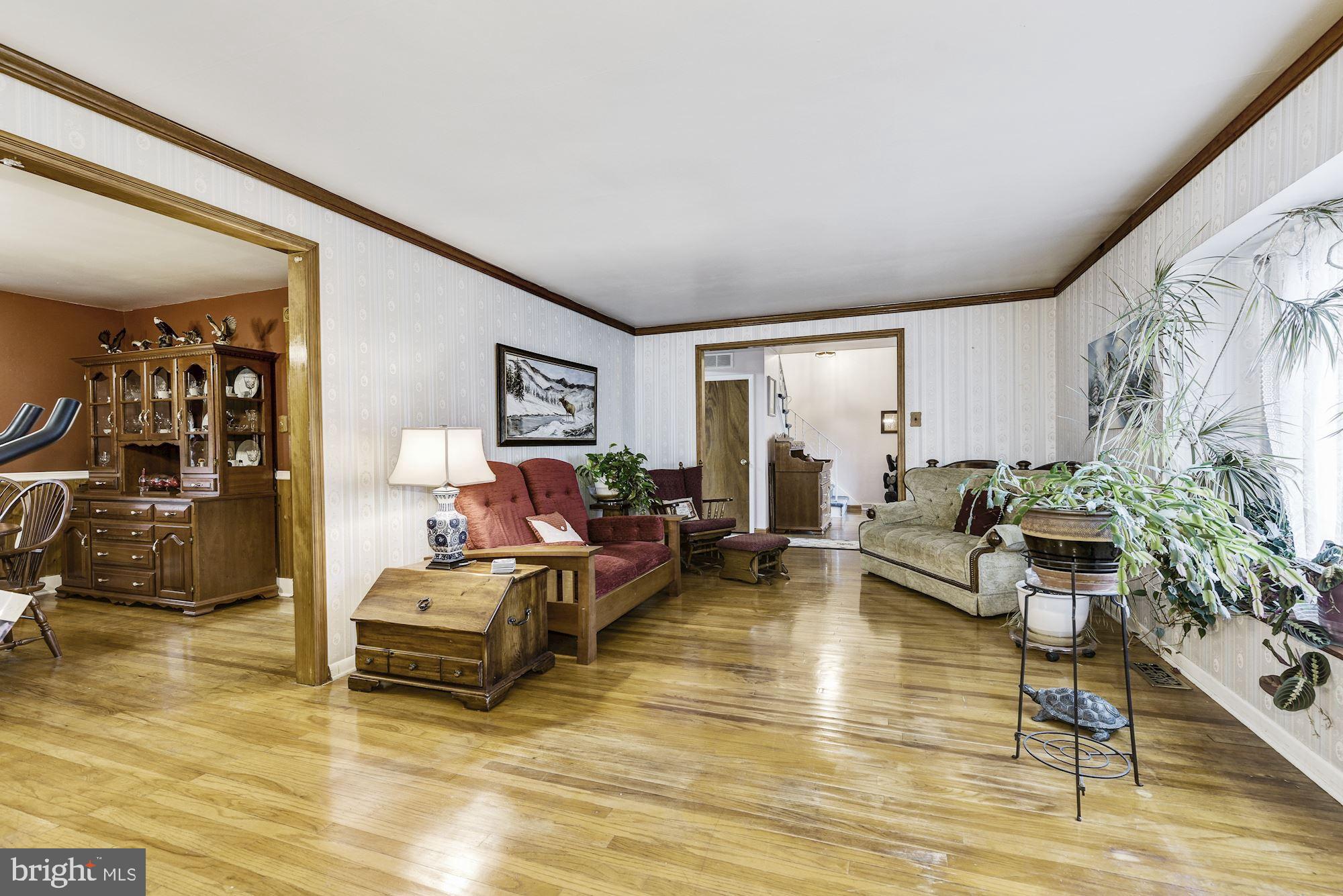 207 Regency Road Edgewater Park, NJ 08010 - Photo 16 of 36 a living room with furniture and wooden floor
