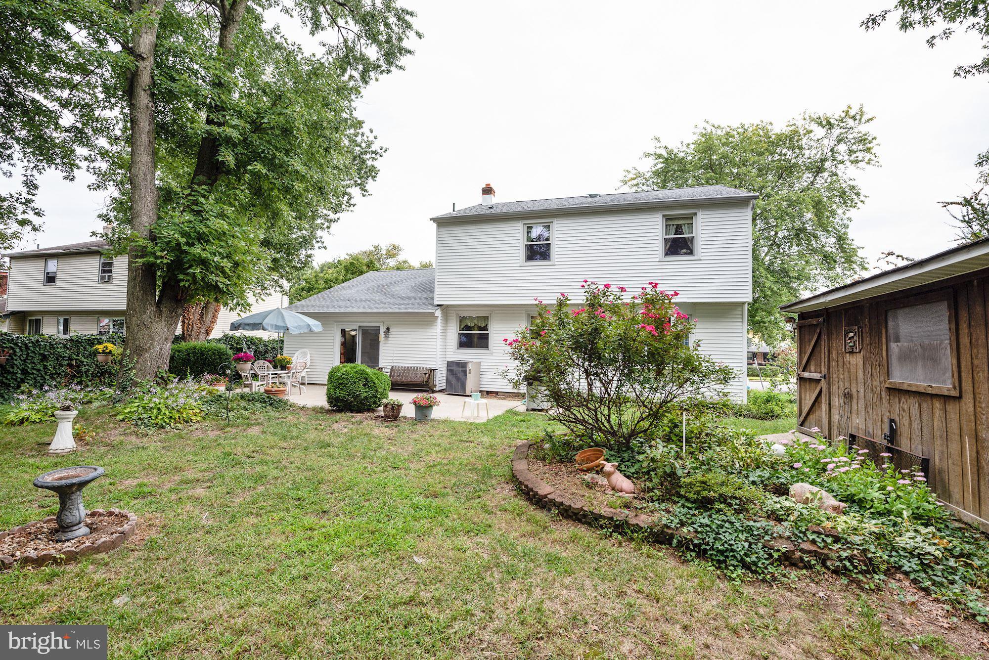 207 Regency Road Edgewater Park, NJ 08010 - Photo 3 of 36 a view of a house with backyard and sitting area