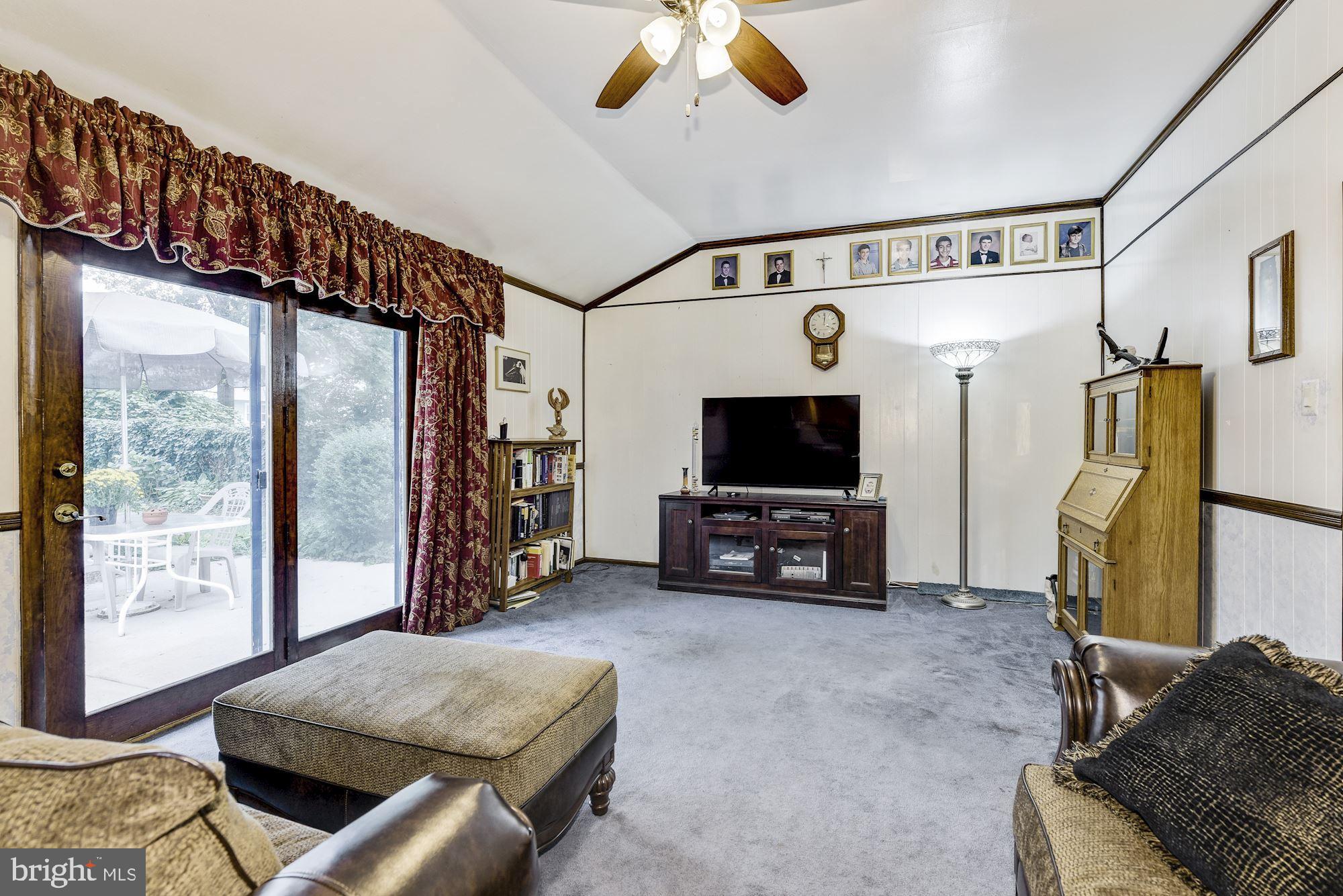 207 Regency Road Edgewater Park, NJ 08010 - Photo 24 of 36 a living room with furniture and a flat screen tv