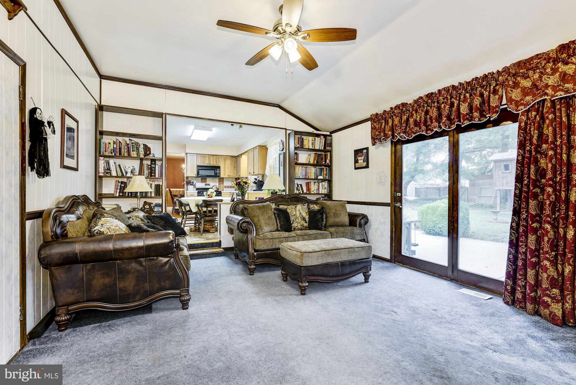 207 Regency Road Edgewater Park, NJ 08010 - Photo 25 of 36 a living room with furniture and a chandelier