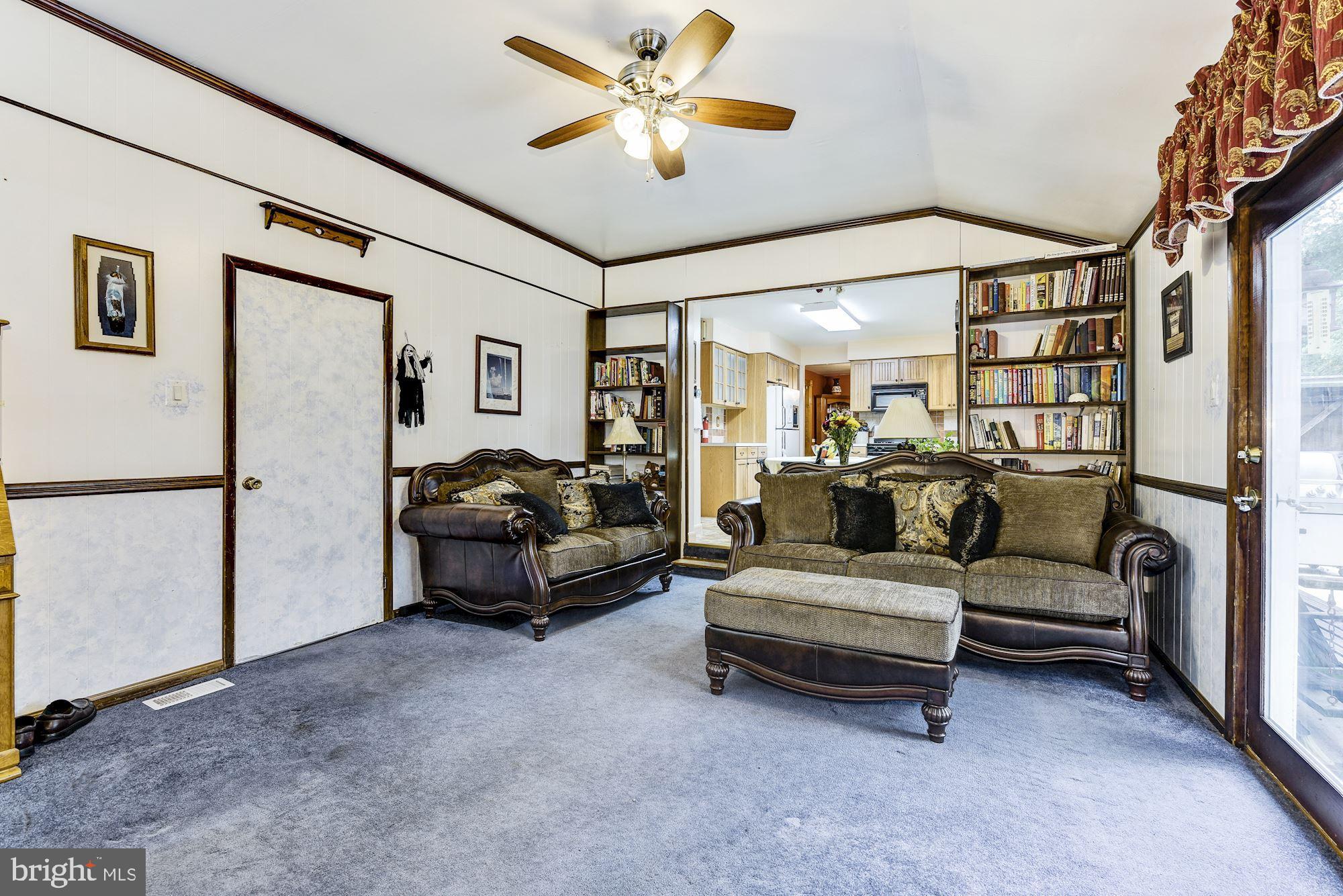 207 Regency Road Edgewater Park, NJ 08010 - Photo 26 of 36 a living room with furniture and a chandelier