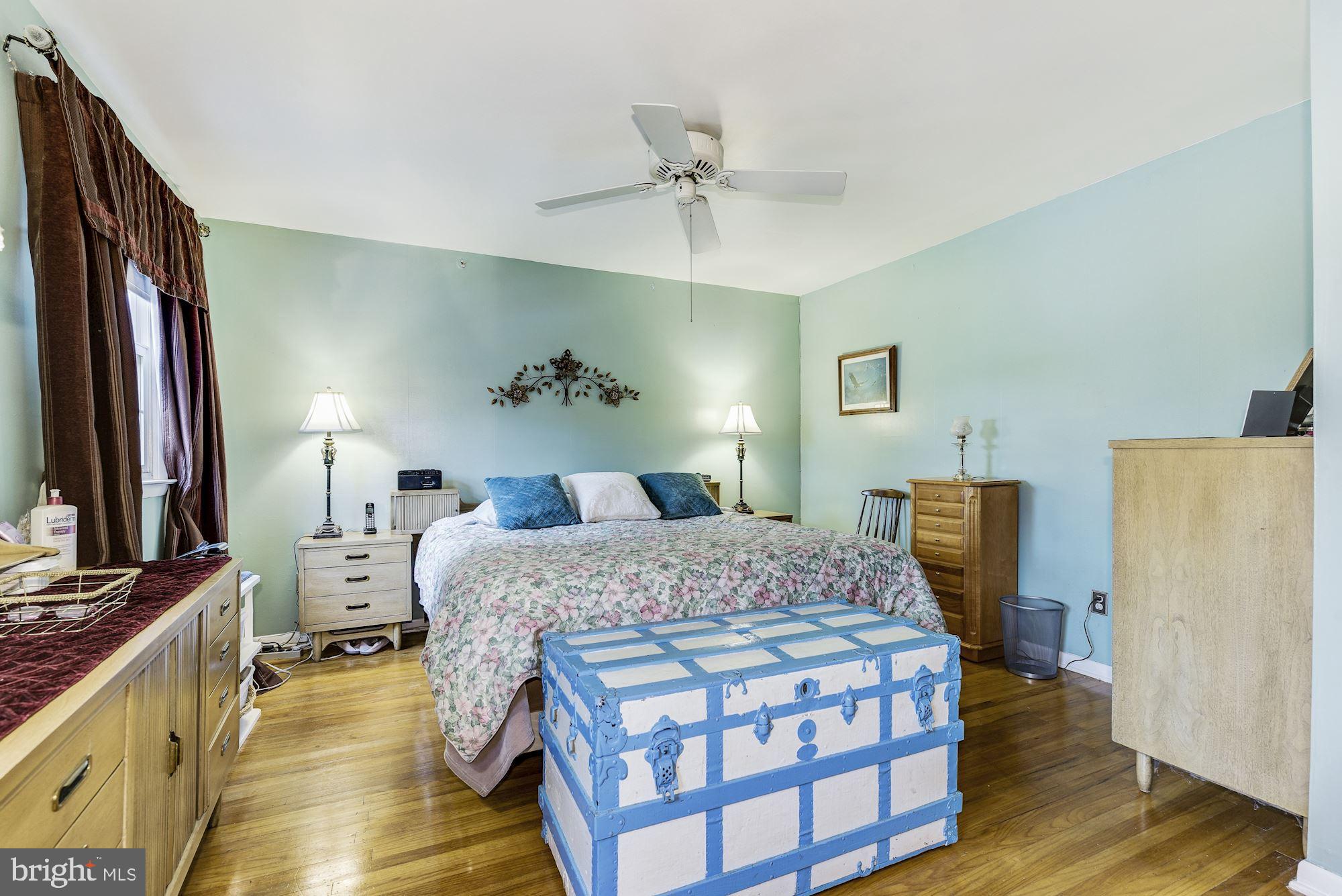 207 Regency Road Edgewater Park, NJ 08010 - Photo 28 of 36 a bedroom with a bed and a flat screen tv