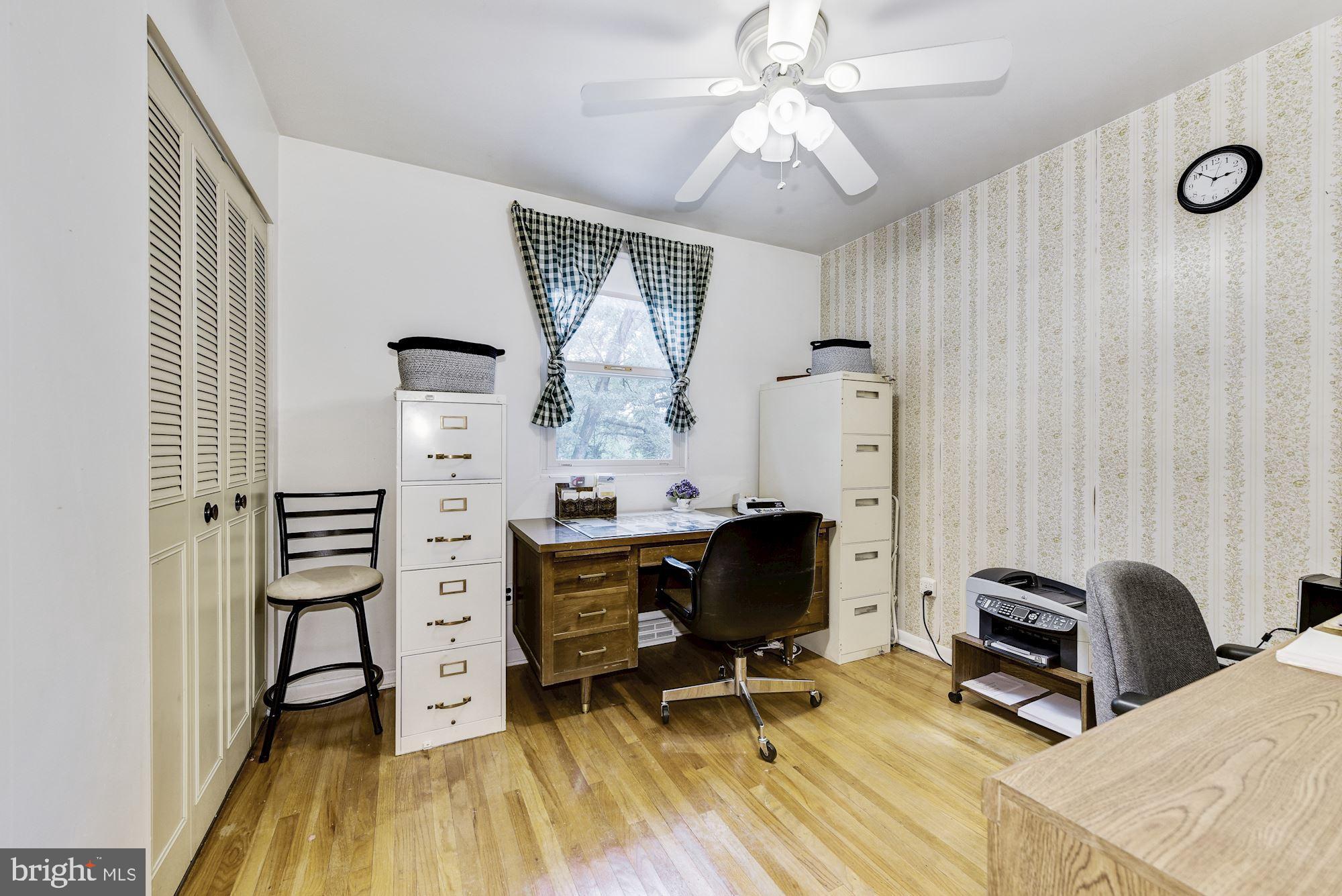 207 Regency Road Edgewater Park, NJ 08010 - Photo 31 of 36 a view of a workspace with furniture and a window