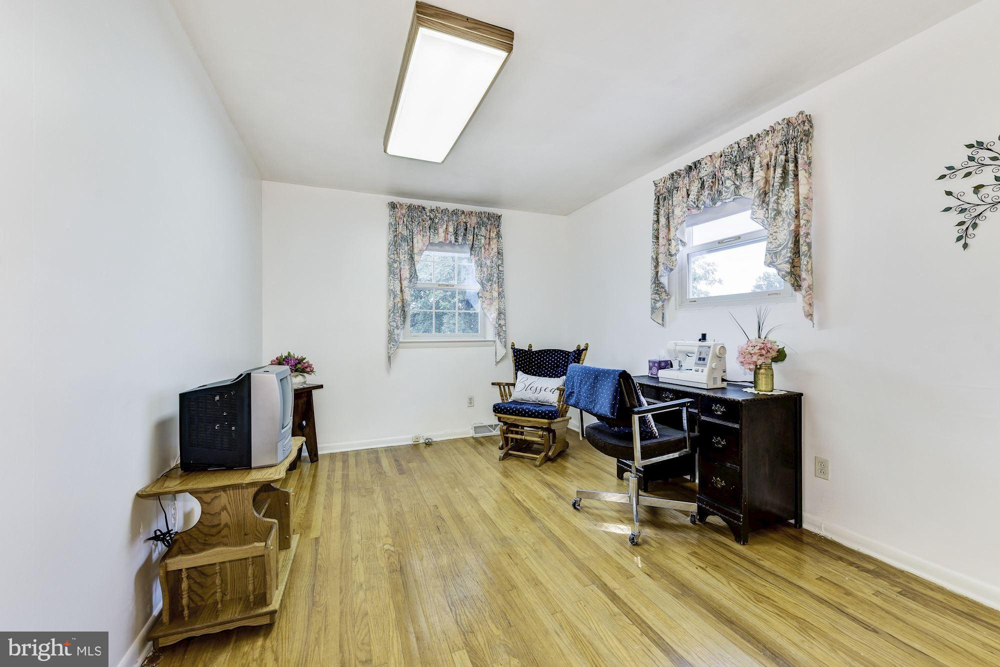 207 Regency Road Edgewater Park, NJ 08010 - Photo 33 of 36 a workspace with wooden floor