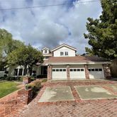 a view of a big yard next to a yard