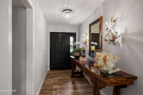 a room with table and chairs