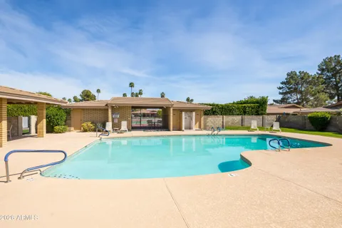 a view of a house with a swimming pool