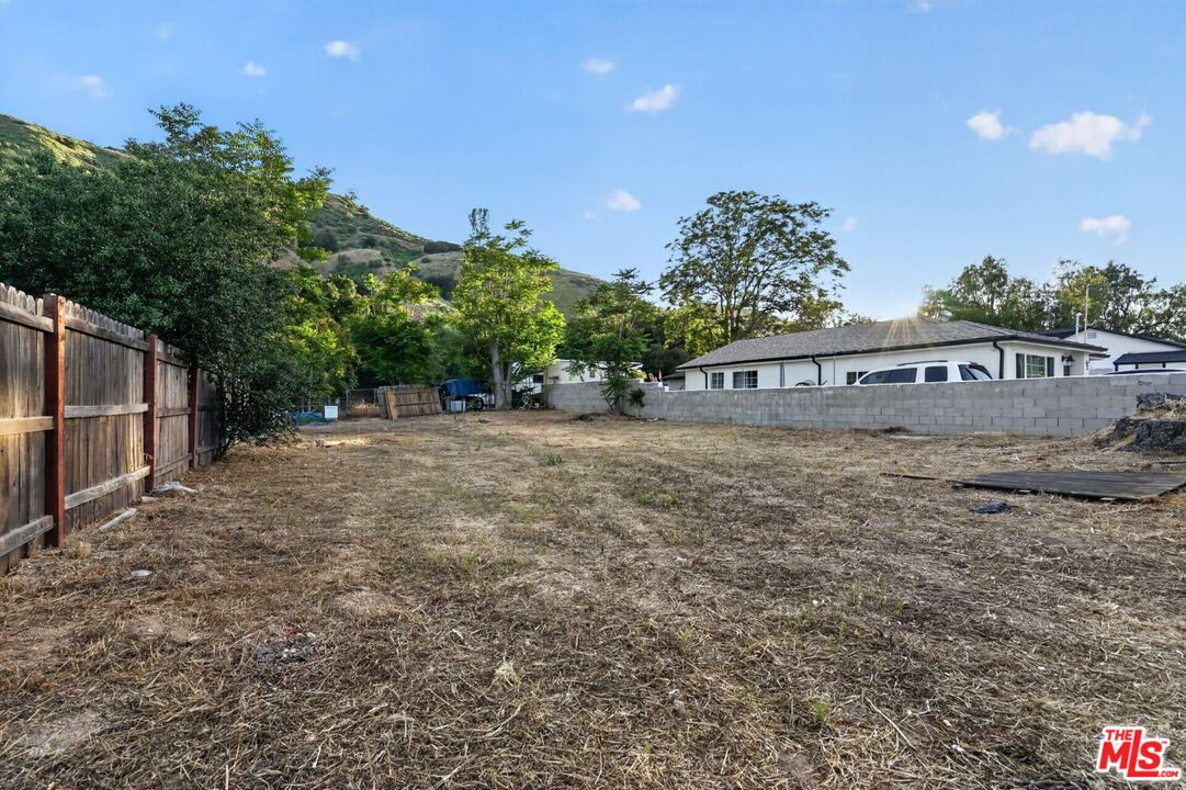 0 Castaic Road Castaic, CA 91384 - Photo 27 of 34 a view of a house with a yard and a garage