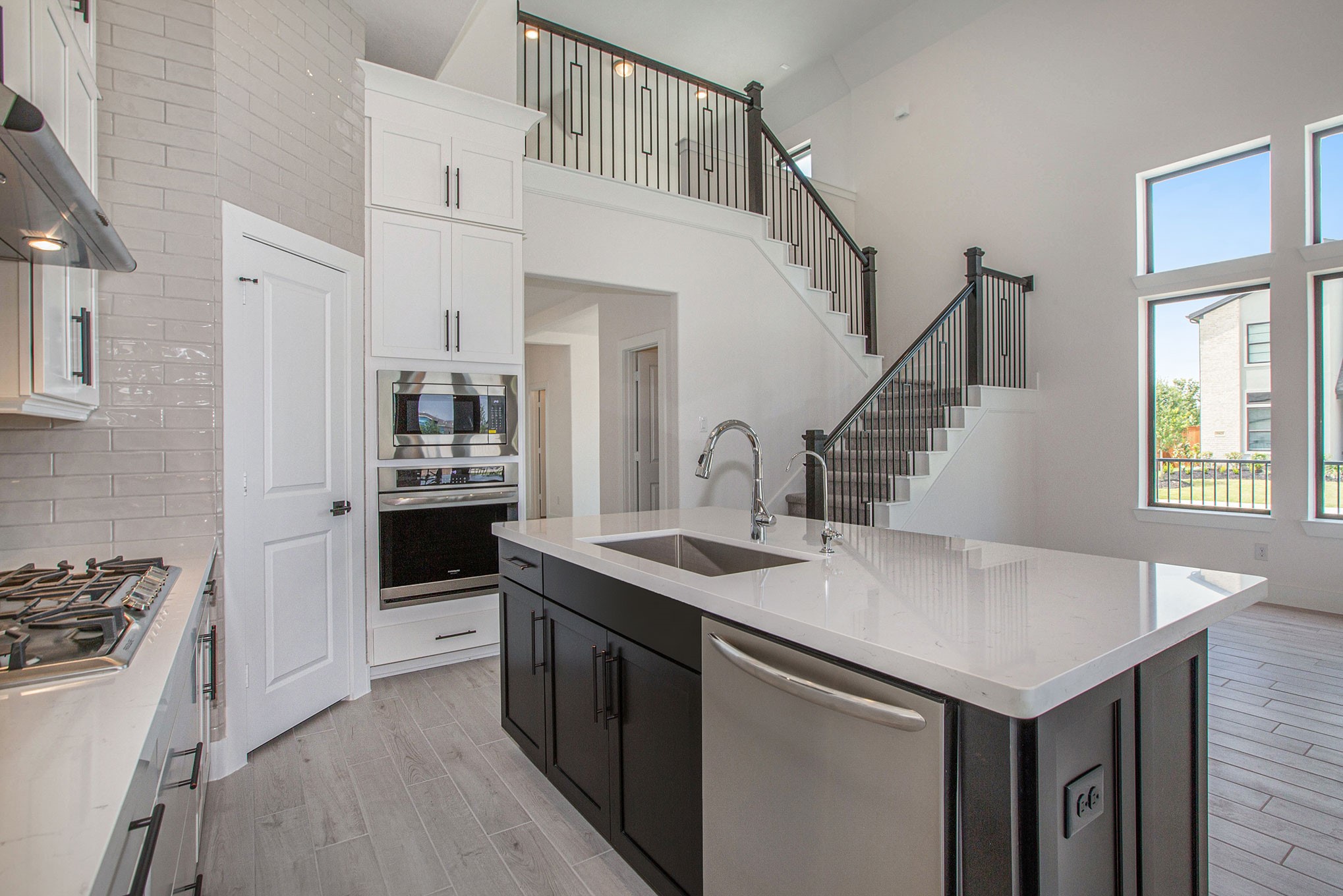 15018 Bonham Shore Drive Cypress, TX 77433 - Photo 11 of 31 a kitchen with a stove a refrigerator and a stove