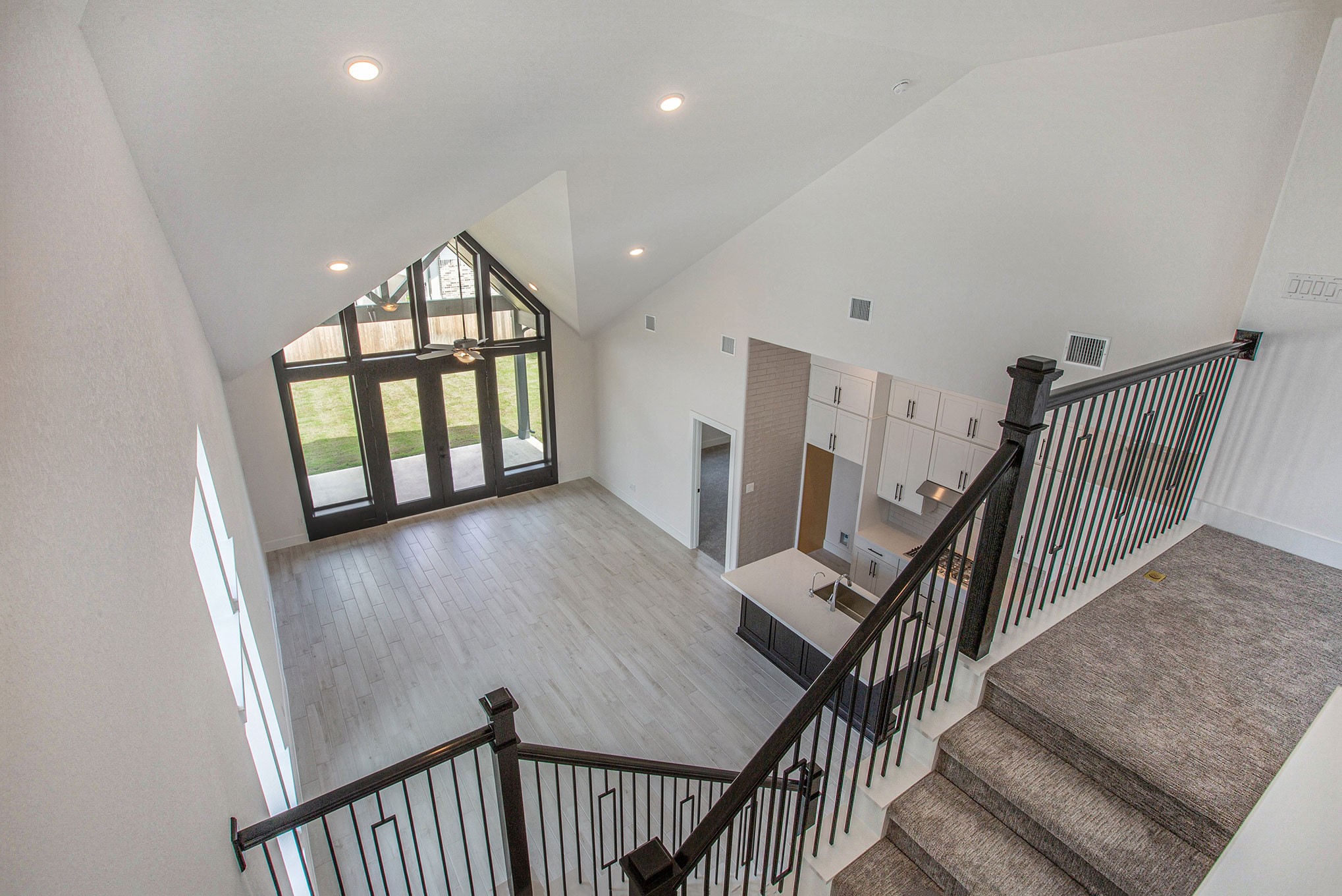 15018 Bonham Shore Drive Cypress, TX 77433 - Photo 21 of 31 a view of an entryway wooden floor and an empty room